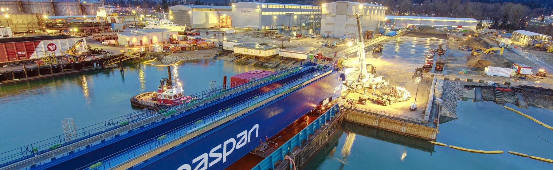 big blue being delivered via barge