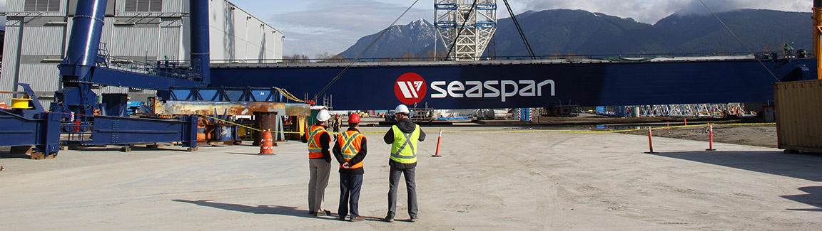 Seaspan workers in front of the Big Blue crane