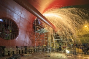 person grinding with sparks flying