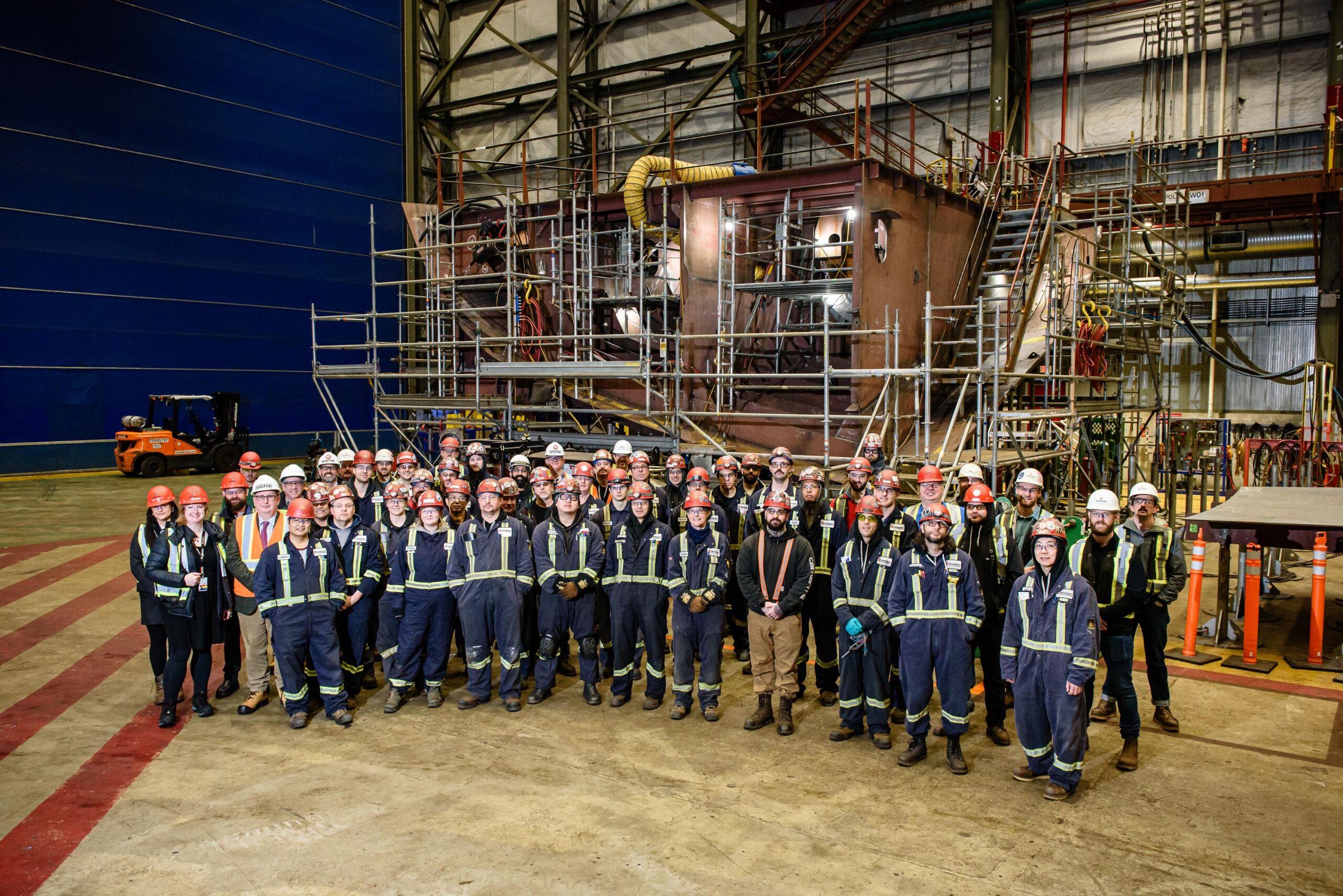 Group in front of ship block