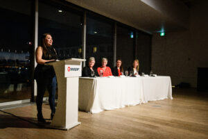 Woman speaking at podium