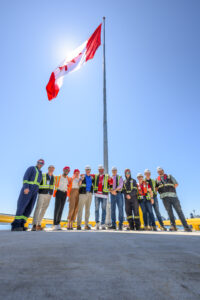 Group in front of Canada Flag