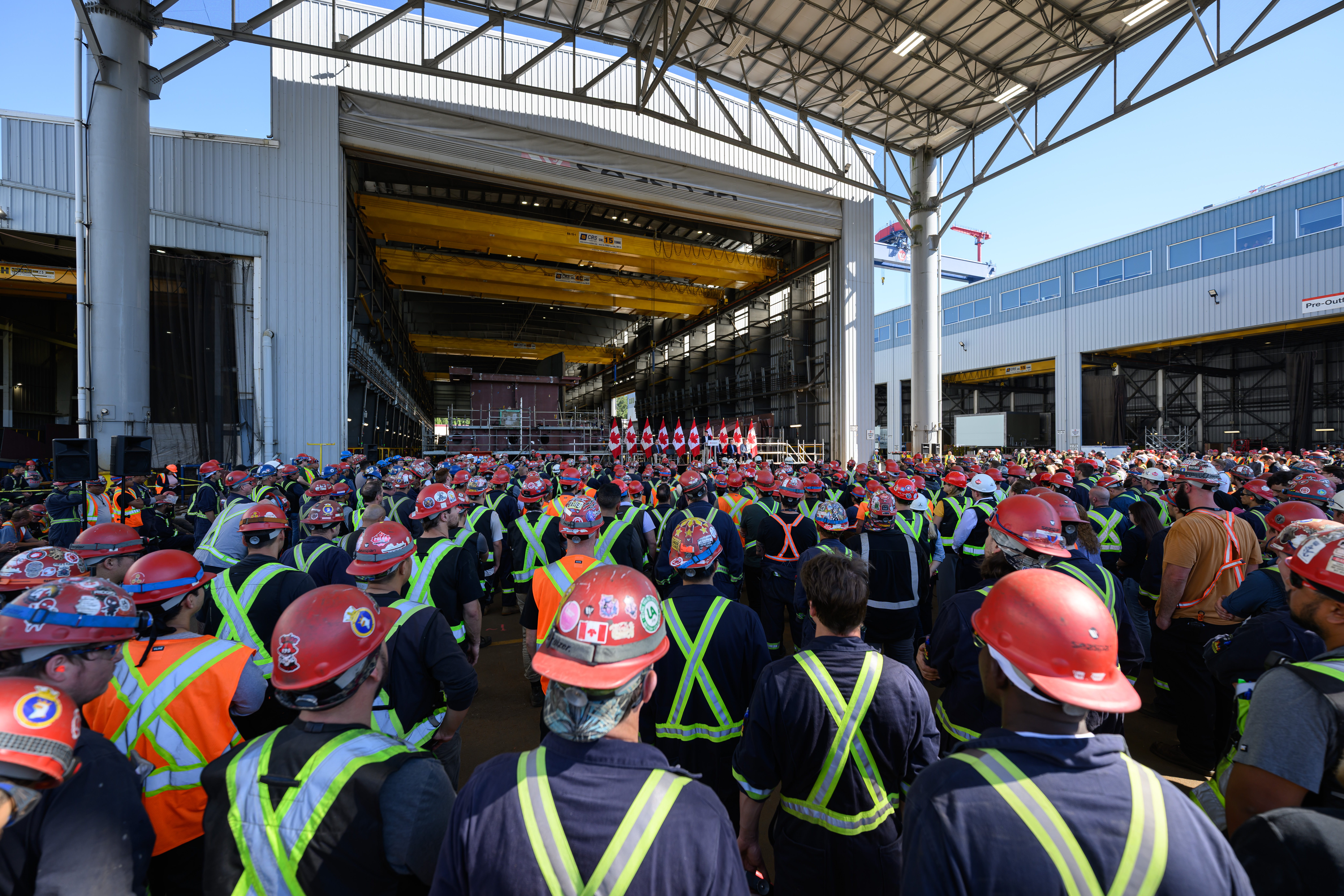Group of tradespeople in front of stage