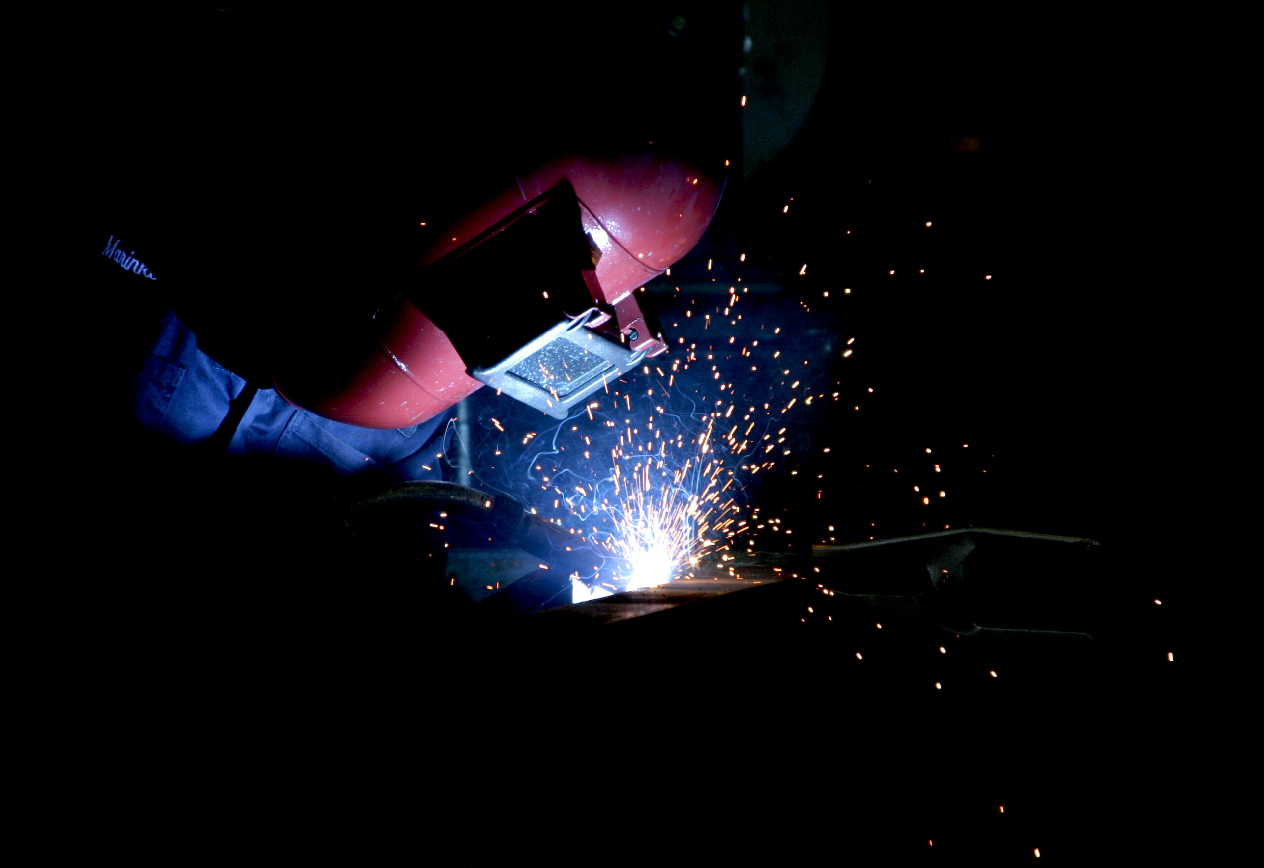 person welding