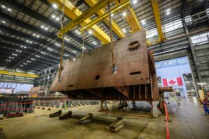 Steel block suspended in the air of a shipbuilding warehouse at vancouver shipyards