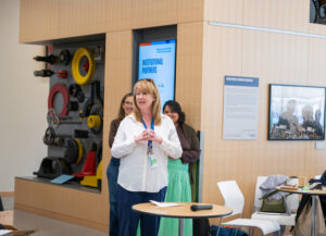 Lisa Hubbard, Executive Director of the North Shore Neighbourhood House, thanks the room of engineers.